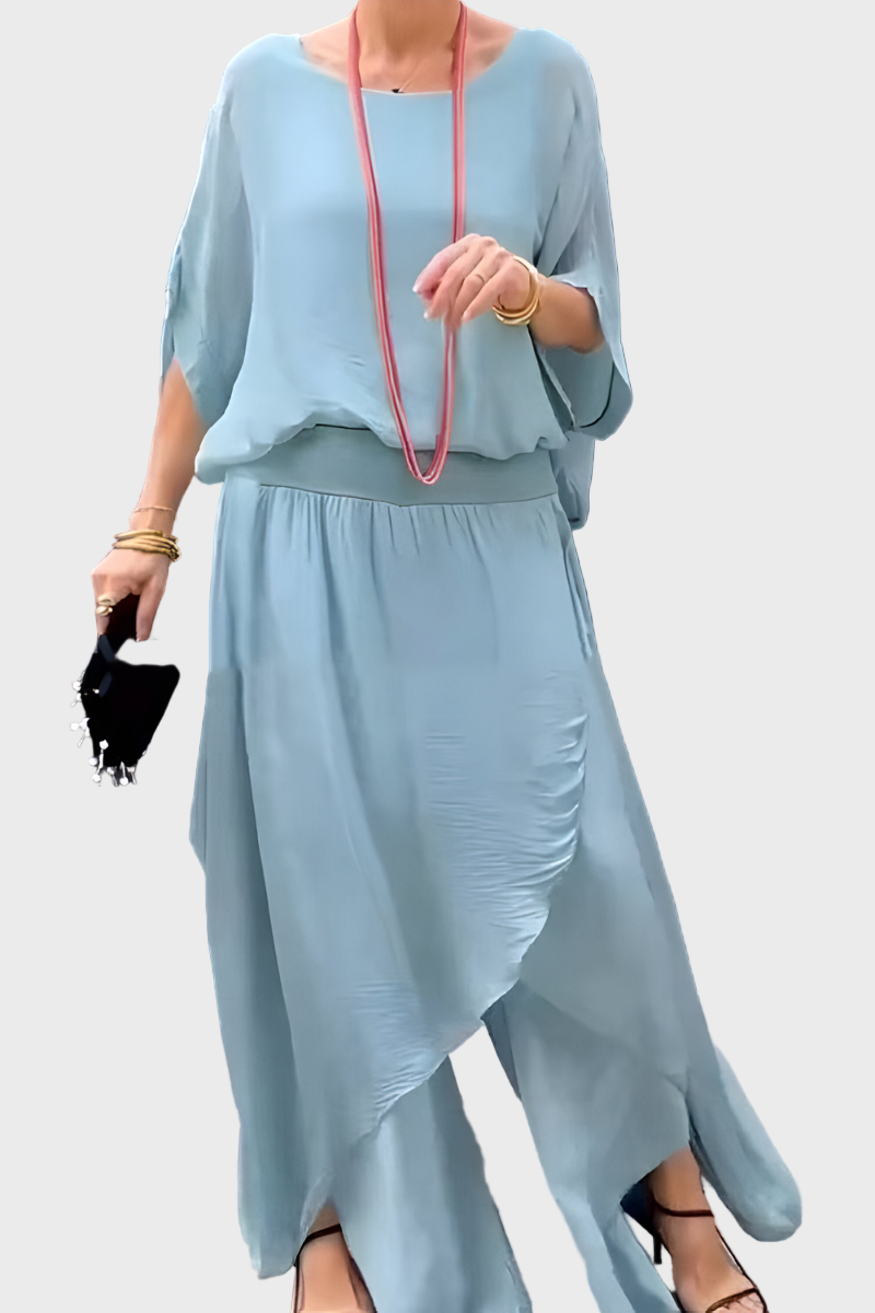 Šifonist kaheosaline komplekt: seelik ja rebenenud laiad püksid